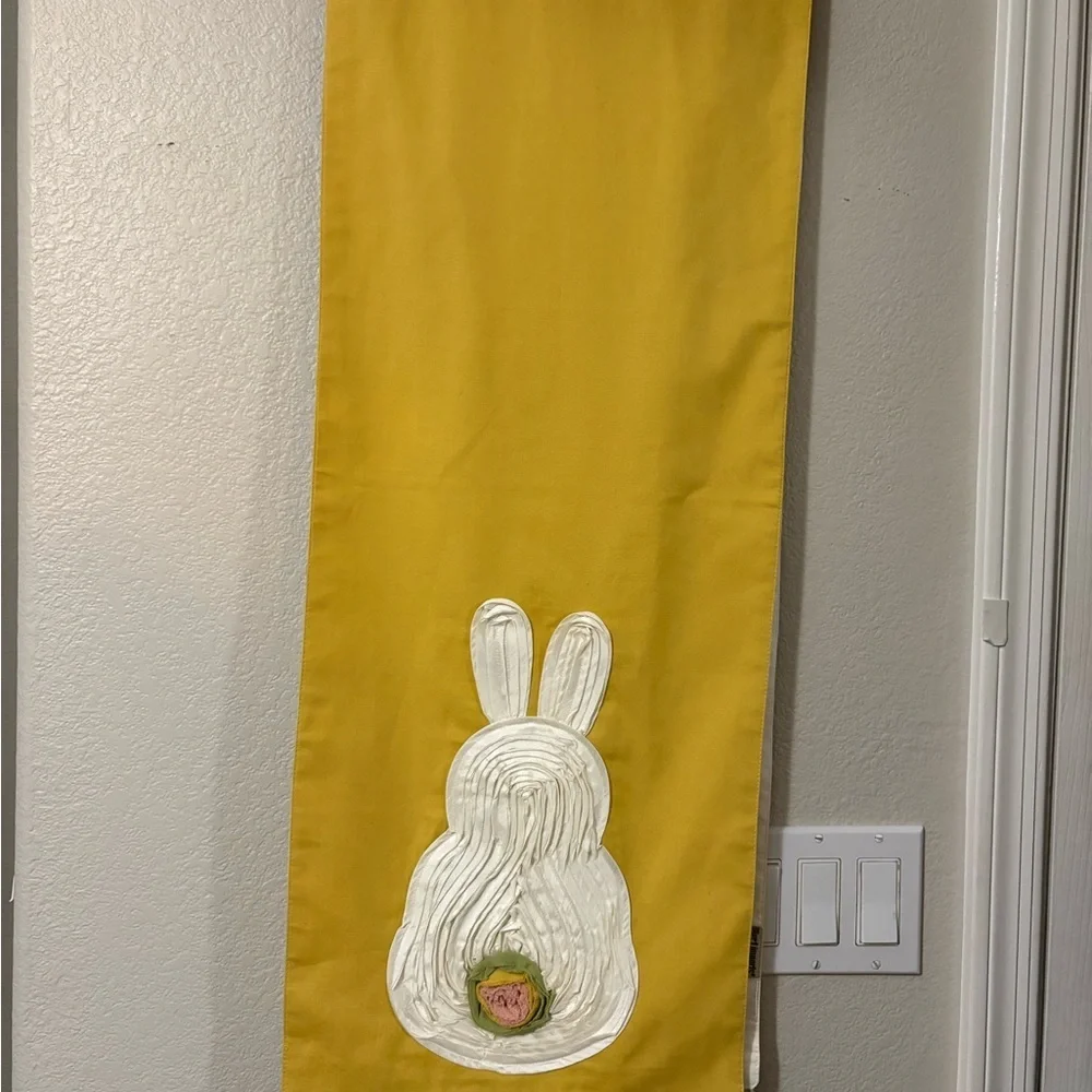 Cute bunny table runner by Pier 1 Imports. Golden yellow with cream bunnies.